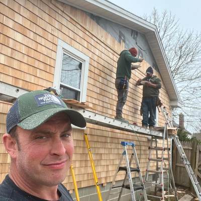 Christopher Ballard and the CB Builders Corp. crew on a South Shore siding job