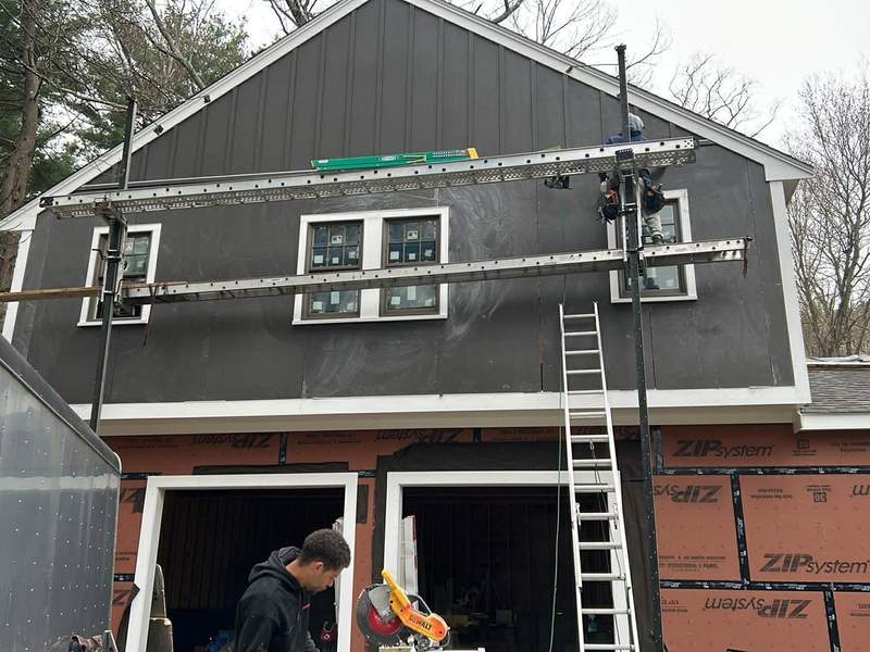 Board & Batten Siding project on the South Shore by CB Builders Corp.